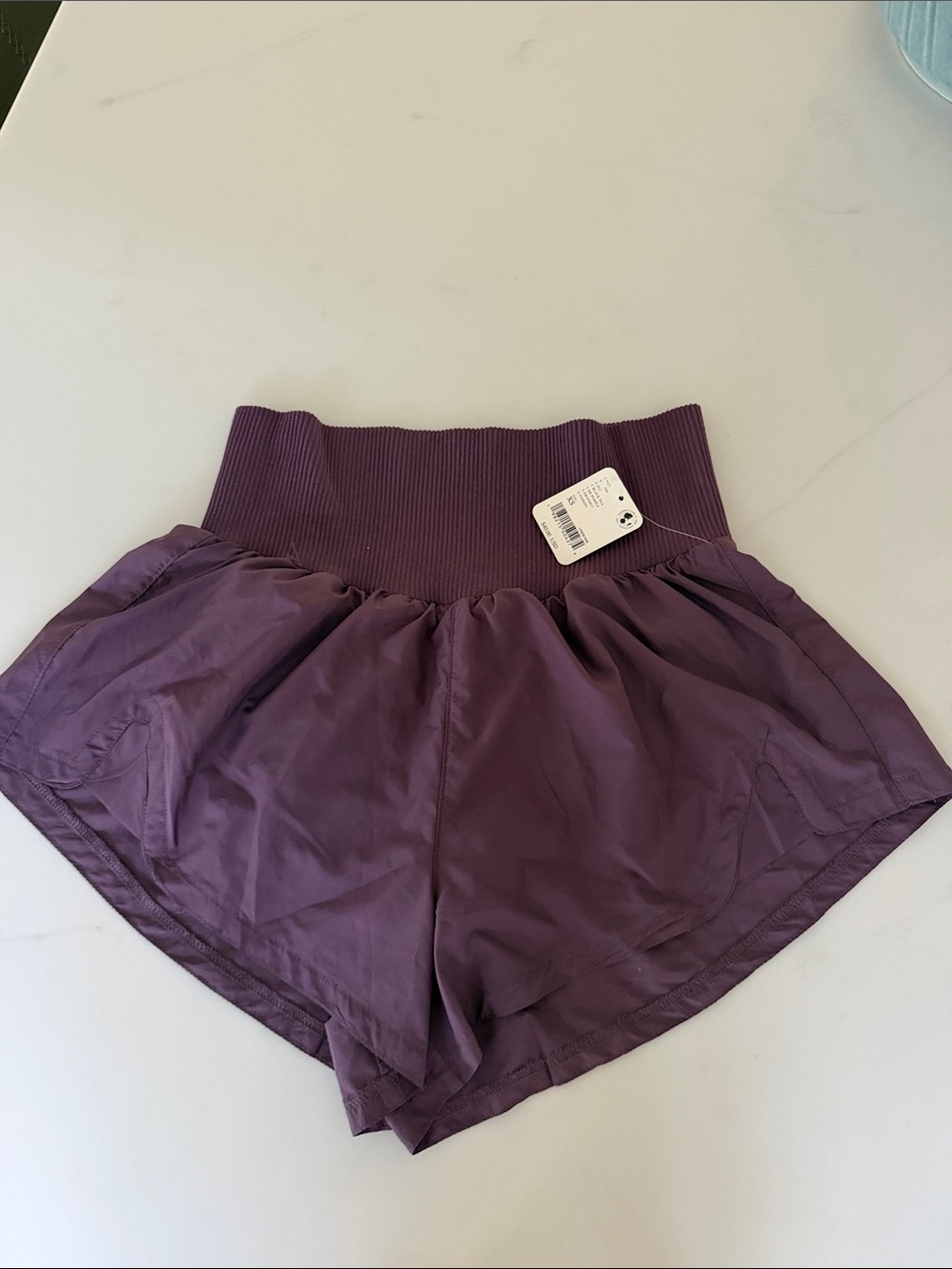 Free People High-Waist Ribbed Waistband Athletic Shorts in Plum